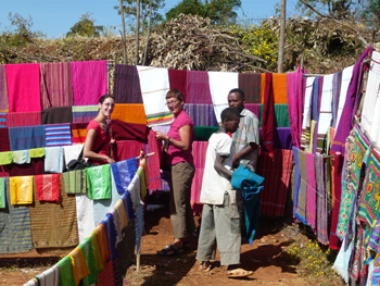 Hanny and Brechtje buying 100 woven shawls near Arba Minch for a benefit sale in Holland for Zigit School